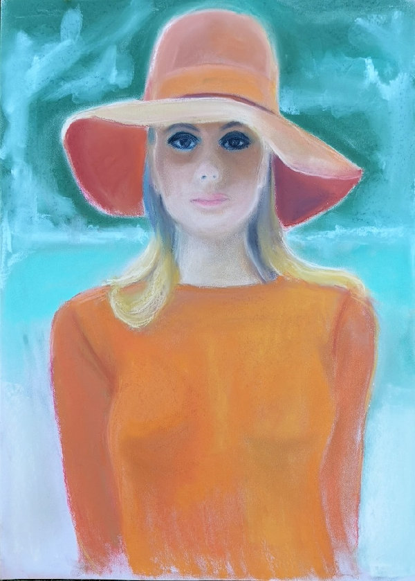 A blond girl with a large hat wearing orange blouse