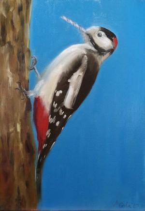 Mechanical woodpecker