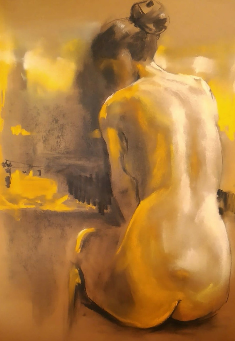 Naked women seen from behind in yellow light.