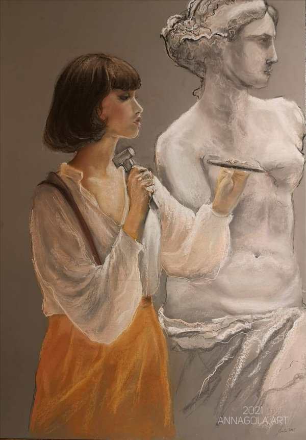 A young woman sculpting an ancient statue of Venus de Milo.